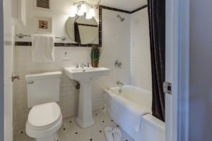 A black and white ceramic bathroom design