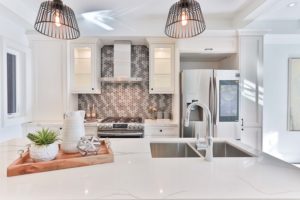 a two-basin kitchen sink in a kitchen island